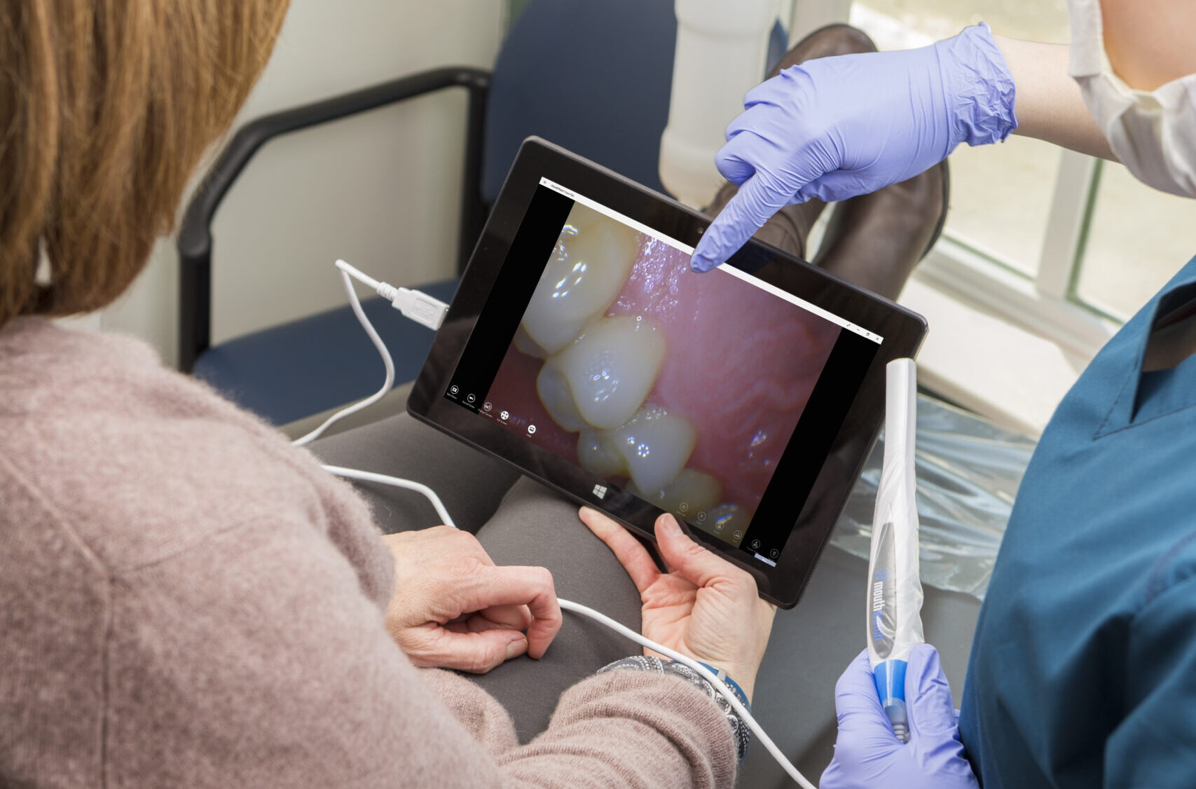 Holding MouthWatch Camera