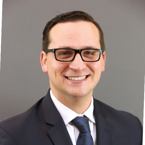 Headshot of Nathan Suter, DDS, Clinical Advisor on the MouthWatch team.