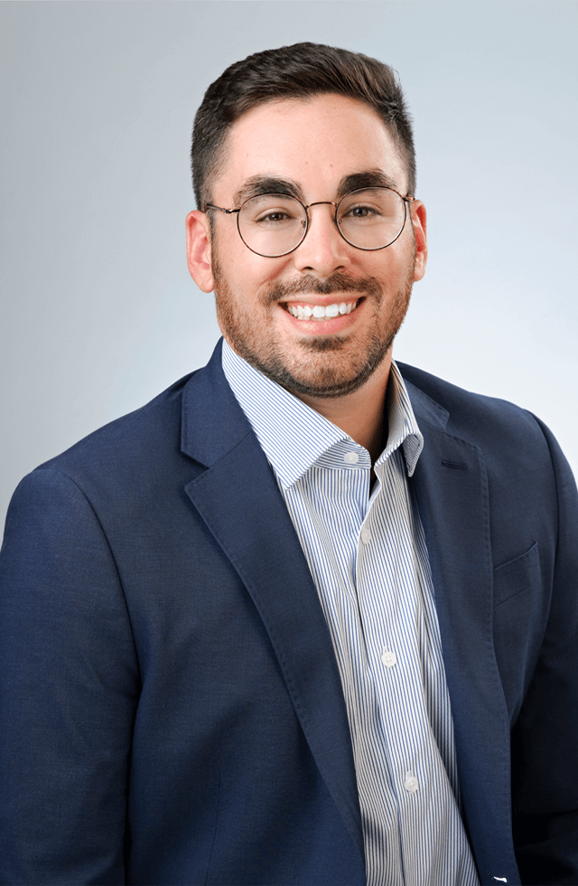 Headshot of Tim Santoro, Operations Manager on the MouthWatch team.