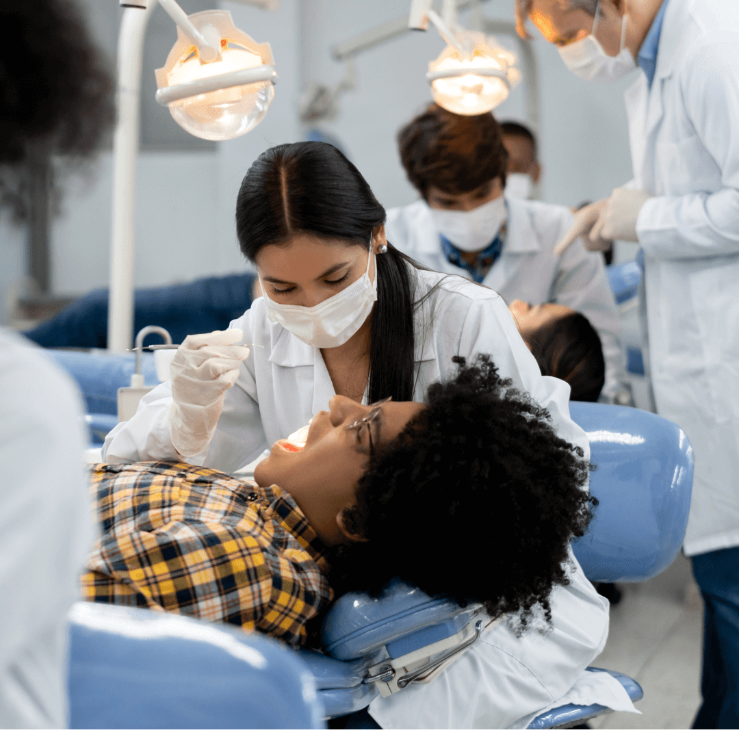 Dental students working on patients